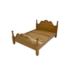 Pine double bed, raised on square and turned supports 