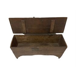 17th century six plank boarded chest or coffer, the hinged lid fitted with iron work, the front with shaped apron and brackets