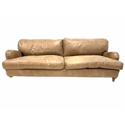 Loaf - Large three seat 'Jonesy' sofa, with squab cushions, upholstered in 'beaten walnut' tan leather, raised on pale oak turned supports 