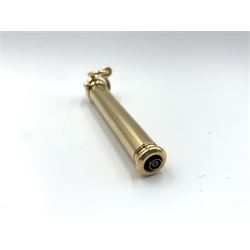 Gold cased propelling pencil inset with a simulated diamond, tests as 18ct L6cm