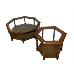 Two octagonal tables with glass tops
