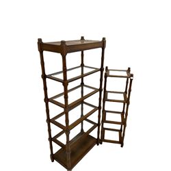 20th century hardwood five tier etagere, each shelf with inset glass panel, raised on turned supports, together with a smaller four tier etagere of similar design 