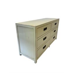 Cream hardwood sideboard, fitted with six drawers, raised on stile supports 