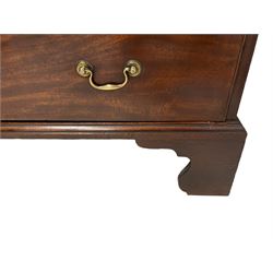 George III mahogany chest-on-chest, projecting moulded cornice over blind fretwork decorated frieze, two short over six long graduating cock-beaded drawers and slide, on bracket feet
