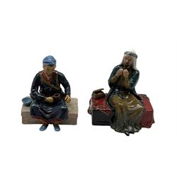 Two Reg Johnson Studio Pottery figures 'Merchant' and 'Egyptian Water Carrier', signed beneath H19cm max