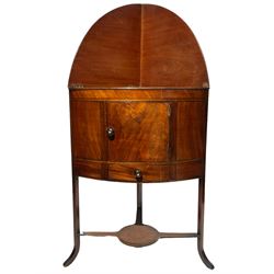 Early 19th century mahogany two tier washstand with hinged top, fitted with single cupboard, raised on square supports terminating at splayed feet 