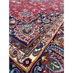 Vintage Persian Tabriz ground carpet, floral medallion on red field with interlaced trailing foliate, 401cm x 292cm