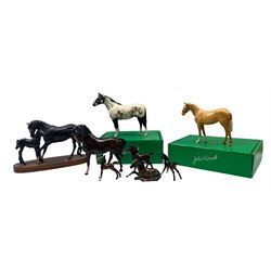 Collection of Beswick horses including Appaloosa Stallion 1772, second colourway, boxed, Palomino H259, boxed, Black Beauty and Foal on wooden plinth, four Beswick brown foals and a Doulton mare (8)