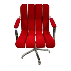 Mid-20th century design polished metal swivel office desk chair, the seat and back in padded sections upholstered in red fabric, five-spoke base