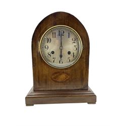 20th century 8day striking mantle clock in an oak veneered case.