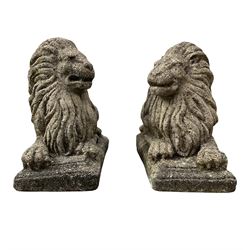 Pair of composite stone garden lions