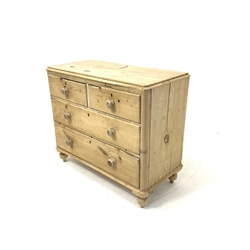 Victorian pine chest fitted with two short and two long drawers, turned supports 