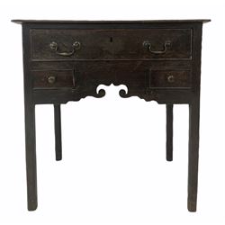 Late 18th century oak low boy, three cock beaded drawers with original brass fittings, over shaped apron, raised on square chamfered supports W71cm