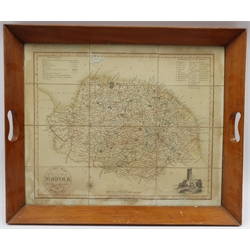 'A New Map of the County of Norfolk', engraved map with later hand-colouring formed as 12 paper panels mounted onto linen by Thomas Dix pub. 1816, framed as an oak serving tray 46cm x 56cm