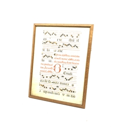 Illuminated Musical manuscript on two vellum leaves illustrated in black and red in double sided frame 50cm x 38cm