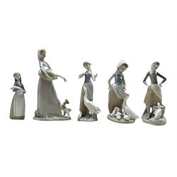 Five Lladro figures comprising 'Sails for the Ducks' no. 1277, 'Girl with Milk Pail' no. 4682, 'Girl with Goose and Dog' no. 4866, 'Girl Holding Pig' no. 1011 and 'Girl with Duck' no. 1052,  three with original boxes, two with matched boxes (5)