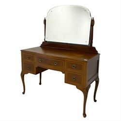 Edwardian mahogany knee-hole dressing chest, raised back with bevelled swing mirror, serpentine front fitted with central frieze drawer flanked by four graduating drawers, raised on cabriole supports