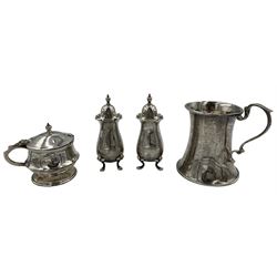 Two silver pepperettes, hallmarked Birmingham 1912, a silver mustard and a small tapered silver mug (4)