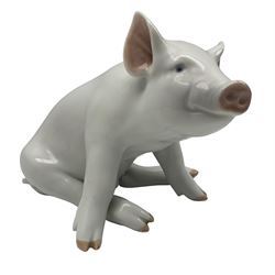 Royal Copenhagen model of a seated pig, model 414, height 16.5cm