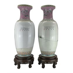 Pair of Chinese Famille Rose porcelain vases, depicting sages, deities and musicians on a boat and ladies seated around a table, a verse poem written to the reverse, red seal mark beneath, with hardwood stands, H61cm 