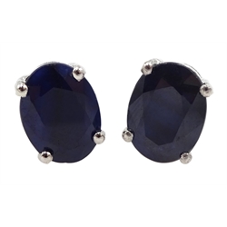 Pair of silver oval sapphire stud earrings