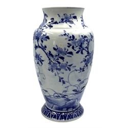 20th century Chinese prunus pattern jar & cover decorated in blue and white H29cm and a blue and white Japanese vase with birds and flowering branches H26cm (2)