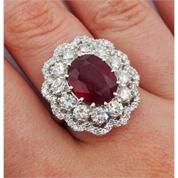 White gold oval ruby and round brilliant cut diamond ring, stamped 14K, ruby approx 5.70 carat, total diamond weight approx  2.70 carat