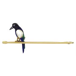Early 20th century blister pearl and enamel magpie bar brooch, stamped 15ct