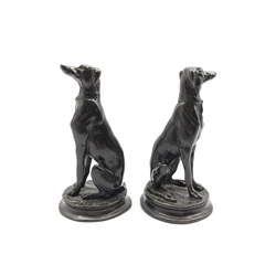 Pair of bronze studies of seated greyhounds after Antoine-Louis Barye on circular bases H17cm