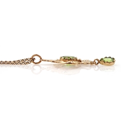 9ct gold peridot open design pendant, Sheffield 1991, on 9ct gold necklace