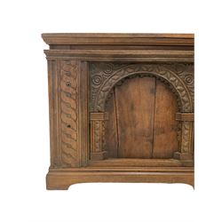 17th century design oak coffer or chest, rectangular hinged top over moulded frieze rail, the panelled sides applied with carved arcade decoration with scrolling foliate corners, flanked by guilloche carved uprights 