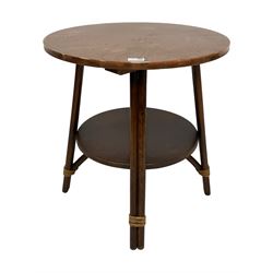 Mid-20th century beech pub table with circular hammered copper top, on splayed supports joined by circular undertier