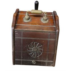 Oak coal scuttle with ornate handle and one shovel