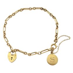Gold link bracelet, with gold heart locket charm and 'S' charm, all 9ct