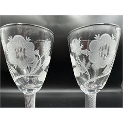 Pair of 18th century style 'Jacobite' engraved air twist wine glasses, each having round funnel bowls engraved with roses, oak leaves and thistles, on circular foot, H16cm 