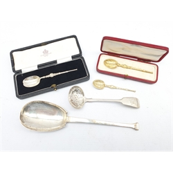 Victorian silver fiddle pattern sifting spoon, Art Deco silver serving spoon Sheffield 1926,  two silver gilt copies of the Anointing spoon, one cased and a silver Anointing spoon, cased 