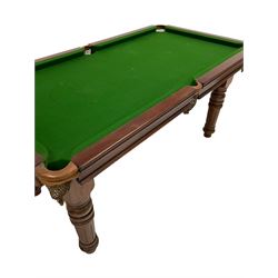 E.J. Riley Ltd. of Accrington - early 20th century mahogany 'rise and fall' snooker table, adjustable height with moulded dining table leaves, turned and fluted supports