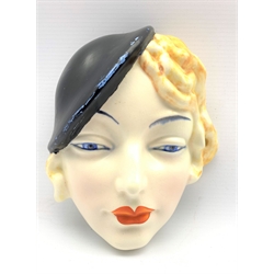 Beswick Art Deco period face mask of a girl wearing a beret, printed backstamp with script number 7777, 17cm