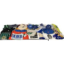 Footballing, sporting, music and other clothing including Leeds United cap, rosettes, flag,  Celtic scarves etc 