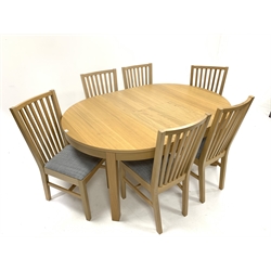 Ikea - Light oak oval extending dining table, with one fold away additional leaf (166cm x 115cm, H74cm) together with a set of six 'Ikea Norrnas' light oak dining chairs, with grey linen upholstered seat pads, raised on square tapered supports, (W43cm)