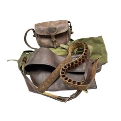 Brady leather cartridge bag, leather gun slip, another in canvas and a leather cartridge belt 