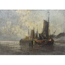 Theodor Hummel (German 1864-1939): Figures Beside Moored Sailing Ships, oil on canvas signed 49cm x 69cm