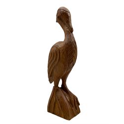 'Gnomeman' carved oak figure of a wading bird, naturalistic base carved with gnome signature on reverse, by Thomas Whittaker of Littlebeck, H33cm