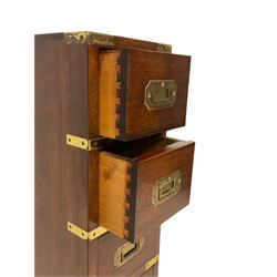 Small military design mahogany pedestal chest, fitted with four drawers, each with recessed brass handles and brass bound details, on bracket feet