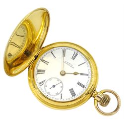 American gold-plated full hunter lever pocket watch by Waltham, No. 8917874, white enamel dial with Roman numerals and subsidiary seconds dial