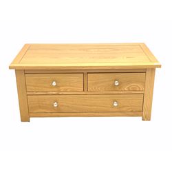 Contemporary light oak TV stand, fitted with two short and one long drawer W110cm