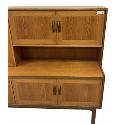 G-Plan - mid-20th century 'Sierra' teak highboard or wall unit, fitted with fall-front and assorted cupboards and drawers