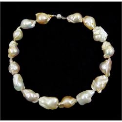 Single strand pin, peach and white baroque pearl necklace, with 9ct white gold clasp