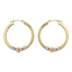 Pair of 9ct gold hoop earrings with applied white and rose gold floral decoration, hallmarked 