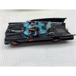 Corgi Toys rocket firing Batmobile No.267, in black gloss, rubber tyres with gold hubs and red bats, blue tinted windscreen, inscribed beneath 'Batman Batmobile', boxed with illustrated card stand, orange missiles, instruction envelope and leaflet